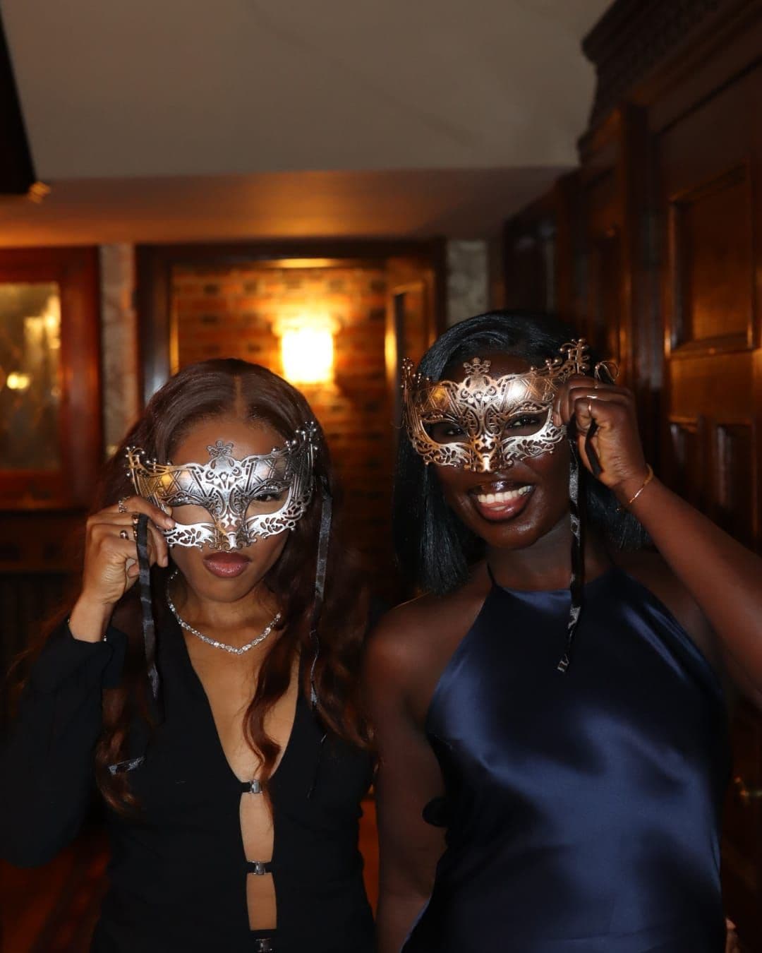 Masquerade guests with filigree masks