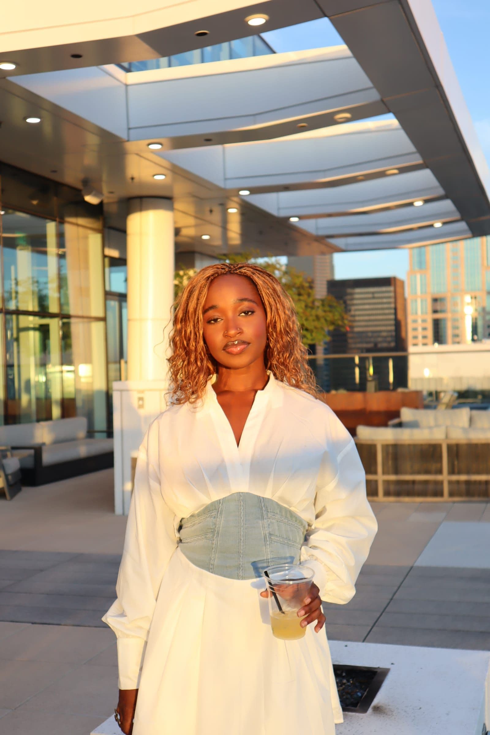 Guest with a cocktail at golden hour